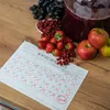 A calendar page with days marked for a fermentation or brewing process, alongside fresh fruits and a large jug of dark liquid. Produktbild-Vorschau