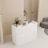 A modern reception desk in a clean, minimalist interior. Produktbild-Vorschau