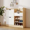 A shoe cabinet with multiple shelves and drawers, displaying various shoes. Voir les images du produit