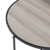 A close-up view of the top surface and edge of a round table. Anteprima dell’immagine prodotto