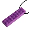 A purple teething necklace shaped like a Lego brick. Produktbild-Vorschau