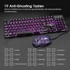 A gaming keyboard and mouse set with purple LED backlighting, shown with a diagram illustrating function key combinations. Produktbild-Vorschau