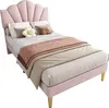 A pink upholstered bed with a shell-shaped headboard, shown with bedding and pillows. Produktbild-Vorschau