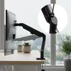 A monitor arm mounted on a desk, with a close-up inset showing a joint mechanism. Anteprima dell’immagine prodotto