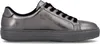 A side view of a silver sneaker with black laces. Náhled obrázku produktu