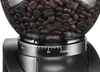 Close-up of a coffee grinder hopper filled with coffee beans, showing the grind adjustment dial. Podgląd zdjęcia produktu