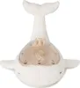 A white plush whale toy with a clear dome on its belly. Anteprima dell’immagine prodotto