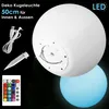 A white LED sphere light is shown, with a blue illuminated sphere below it. Accessories like a USB cable, stake, and remote control are displayed on the left. Produktbild-Vorschau