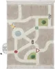 A rug designed as a city map with roads, a roundabout, and various traffic signs and symbols. Voir les images du produit