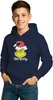 A young boy wearing a navy blue hoodie with a Grinch graphic on it. Produktbild-Vorschau