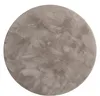 A round, grey rug with a textured surface, presented on a white background. Anteprima dell’immagine prodotto