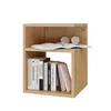 A wooden nightstand with books and glasses on it, isolated on a white background. Podgląd zdjęcia produktu