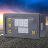 A digital temperature controller with LED displays and buttons, placed on a textured surface with a blurred sky background. Produktbild-Vorschau
