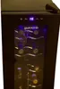 A close-up shot of a Guzzanti wine cooler with bottles inside. Voir les images du produit