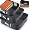 A stack of three black square baking pans with a speckled granite coating, one of which contains a slice of tiramisu. A smaller inset image shows another baking pan with a slice of cake. Anteprima dell’immagine prodotto