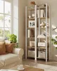 A living room scene with a sofa and a bookshelf. Produktbild-Vorschau