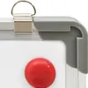 A close-up view of the corner of a whiteboard, showing a magnetic clip and a red magnet. Produktbild-Vorschau