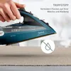 A hand is holding a teal and black steam iron over a beige fabric surface. Text and a symbol are overlaid on the image. Produktbild-Vorschau