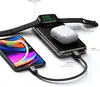 A Satechi Quatro Wireless Power Bank is shown charging an iPhone, AirPods, and an Apple Watch simultaneously. Produktbild-Vorschau