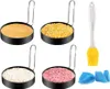 A set of four round metal molds filled with different food items, along with a silicone brush and two small blue silicone holders, arranged on a white background. Náhled obrázku produktu