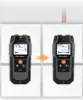 Two MAKA® wall scanners are shown side-by-side on a tiled wall, with an orange arrow indicating movement from left to right. A wooden stud is visible in the background. Podgląd zdjęcia produktu