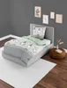 A child's bed with gnome-themed bedding in a room. Produktbild-Vorschau