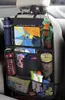 A car seat organizer filled with various items, attached to the back of a car seat. Produktbild-Vorschau