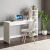 A white desk with a bookshelf and a chair in a room. Voir les images du produit