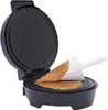 A waffle maker with a freshly made waffle being removed with a cone-shaping tool. Náhled obrázku produktu