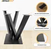 A black metal table base with four legs arranged in a spider-like design, shown on a wooden floor. Callout boxes highlight features like mounting holes and material thickness. Voir les images du produit