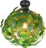 A close-up, studio shot of a spherical ceiling light fixture adorned with artificial green leaves and vines. Produktbild-Vorschau