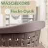 A close-up of a brown woven laundry basket with text overlay advertising its features. Produktbild-Vorschau