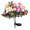 A solar-powered string light shaped like pink flowers and green leaves, with a solar panel at the base. Náhled obrázku produktu
