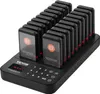 A black restaurant pager system with 20 pagers on a charging base, displayed on a black surface. Anteprima dell’immagine prodotto