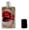 A perfume bottle with a cap next to it, on a white background. Produktbild-Vorschau
