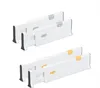Two sets of white drawer dividers, each containing two dividers. Produktbild-Vorschau