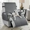 A dog is resting on a recliner covered with a gray slipcover. Anteprima dell’immagine prodotto