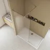 A modern bathroom with a walk-in shower and a vanity. Produktbild-Vorschau