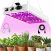 A white LED grow light suspended above various potted plants. Náhľad obrázku produktu