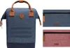 A collage showing a blue backpack and two accessory pouches in blue and pink. Voir les images du produit