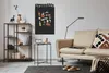 A living room scene with a sofa, bookshelf, and a magnetic board with travel magnets. Anteprima dell’immagine prodotto