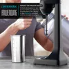 A person is using a stand mixer to prepare a protein shake. Produktbild-Vorschau