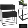 Multiple views of black metal planters on stands. Produktbild-Vorschau