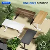 Four different desks with different color tops and legs, surrounded by greenery. Anteprima dell’immagine prodotto