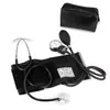 A manual blood pressure monitor and stethoscope are laid out on a white background, along with a black carrying case. Produktbild-Vorschau