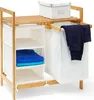 A bamboo laundry basket with fabric compartments and shelves, holding folded towels and dark clothing. Náhled obrázku produktu