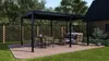A backyard scene with a black pergola, outdoor dining set, and lounge furniture on a wooden deck. Produktbild-Vorschau