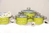 A set of four lime green enamel pots with daisy decorations and glass lids, arranged on a white surface. Náhľad obrázku produktu