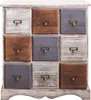 A wooden chest of drawers with nine drawers of varying colors and finishes. Podgląd zdjęcia produktu