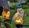 Garden scene at dusk with solar-powered animal lights. Náhled obrázku produktu
